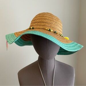 Woven floppy beach hat with tassels